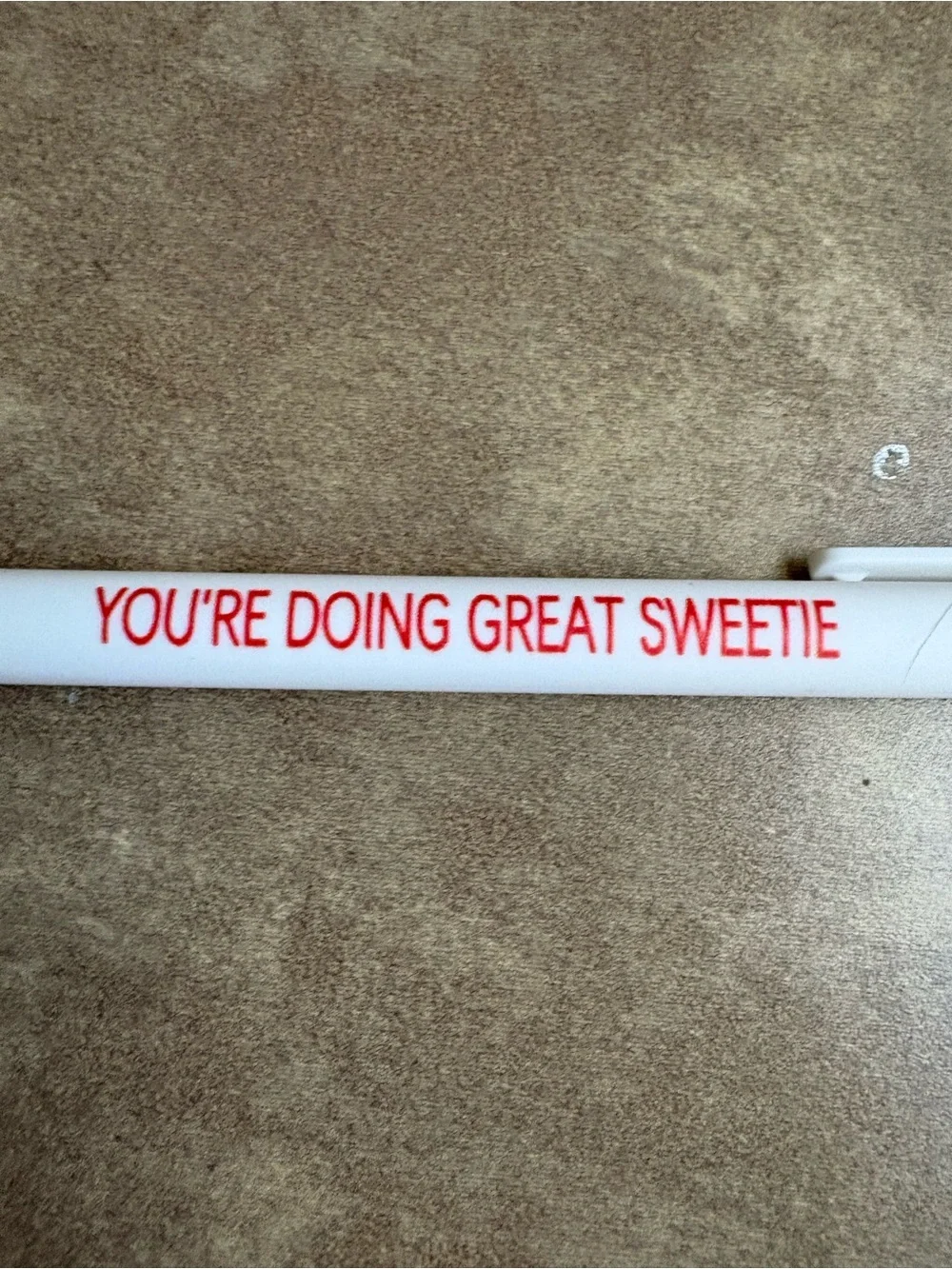 Sarcastic white pen “you’re doing great”